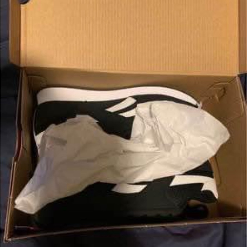 Womens Reebok Black and White Sneakers